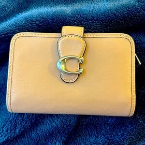 Coach “Tabby” wallet in Pink.  Used for an hour